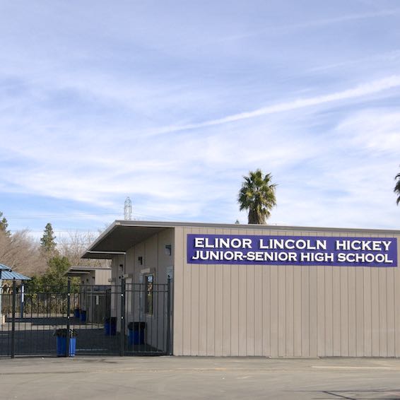 Elinor Lincoln Hickey Junior-Senior High School sign on side of portable classroom